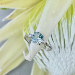 Elegant Round Cut Aquamarine and Diamond Accent White Gold Ring