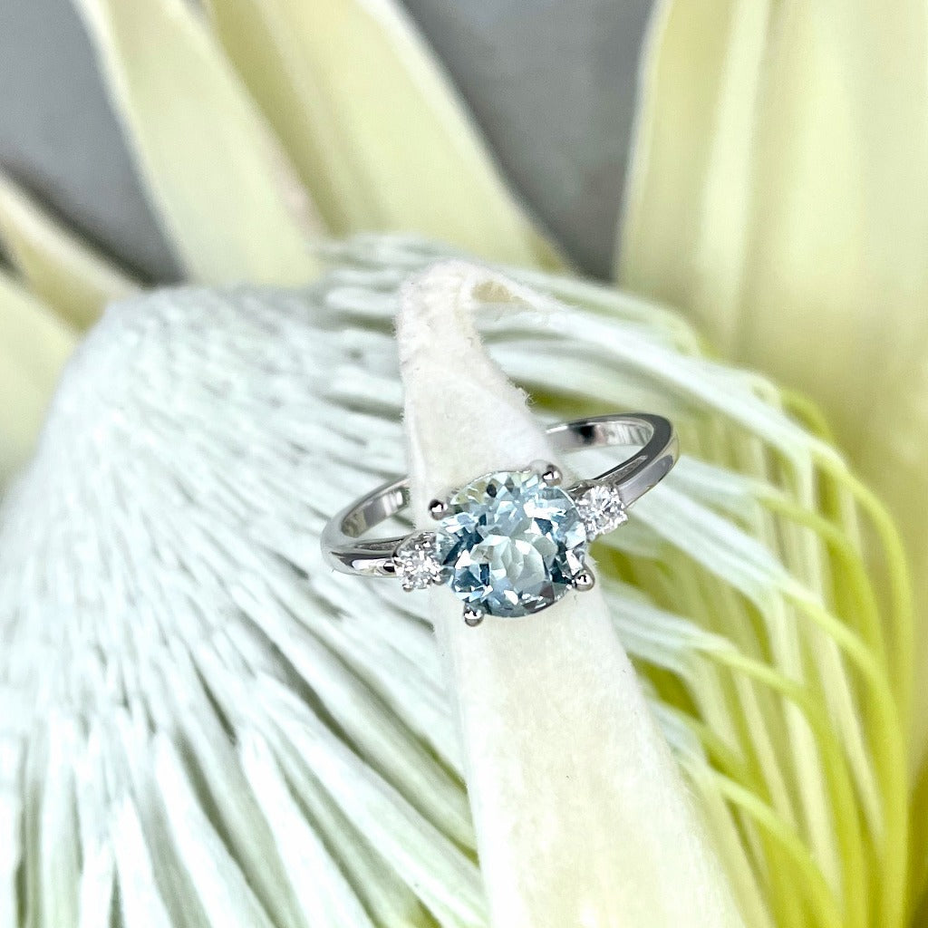 Elegant Round Cut Aquamarine and Diamond Accent White Gold Ring