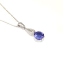 Elegant Round Tanzanite with Diamond Droplet Pendant