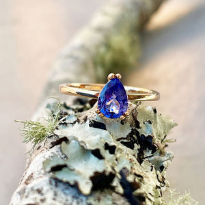 Elegant Solitaire Double Claw Pear Tanzanite Ring