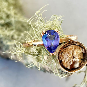 Elegant Solitaire Double Claw Pear Tanzanite Ring
