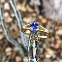 Elegant Split Shoulder Round Cut Tanzanite Yellow Gold Ring