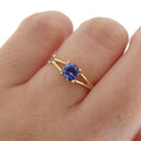 Elegant Split Shoulder Round Cut Tanzanite Yellow Gold Ring