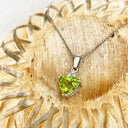 Elegant Trilliant Cut Peridot with Trilogy Diamond Highlight Pendant
