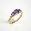 Elegant Trilogy Round Cut Tanzanite Ring