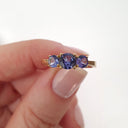 Elegant Trilogy Round Cut Tanzanite Ring