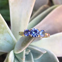 Elegant Trilogy Round Cut Tanzanite Ring