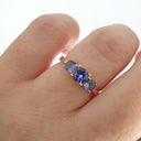 Elegant Trilogy Round Cut Tanzanite Ring