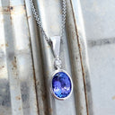 Elegant Tube Set Oval Tanzanite and Diamond White Gold Pendant