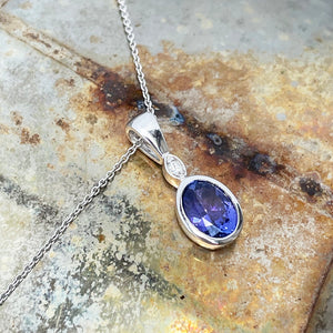 Elegant Tube Set Oval Tanzanite and Diamond White Gold Pendant