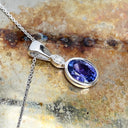 Elegant Tube Set Oval Tanzanite and Diamond White Gold Pendant