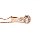 Elegant Tube Set Round Cut Morganite and Diamond Rose Gold Pendant
