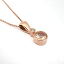 Elegant Tube Set Round Cut Morganite and Diamond Rose Gold Pendant