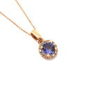 Elevated Tanzanite and Diamond Halo Pendant in Rose Gold