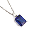 Emerald Cut Tanzanite with Swish Detailed Fixed Bale pendant