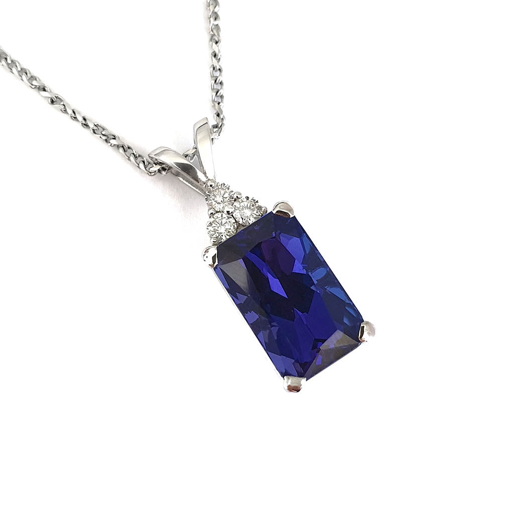 Emerald Cut Tanzanite with Trilogy Accent Diamond Pendant