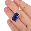 Emerald Cut Tanzanite with Trilogy Accent Diamond Pendant