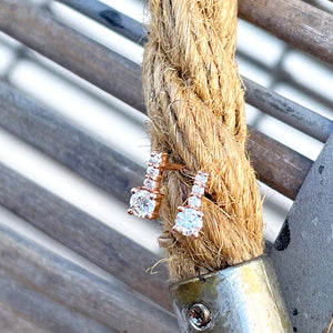 Enchanting Petite White Diamond Rose Gold Studs