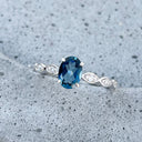 Exquisite London Blue Topaz And Marquise Tapered Band and Diamond Highlight Ring