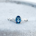 Exquisite London Blue Topaz And Marquise Tapered Band and Diamond Highlight Ring