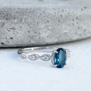Exquisite London Blue Topaz And Marquise Tapered Band and Diamond Highlight Ring