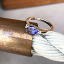 Exquisitely Deep Blue Oval Cut Tanzanite and Diamond Ring