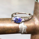 Exquisitely Deep Blue Oval Cut Tanzanite and Diamond Ring