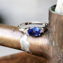 Exquisitely Deep Blue Oval Cut Tanzanite and Diamond Ring