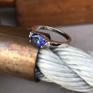 Exquisitely Deep Blue Oval Cut Tanzanite and Diamond Ring