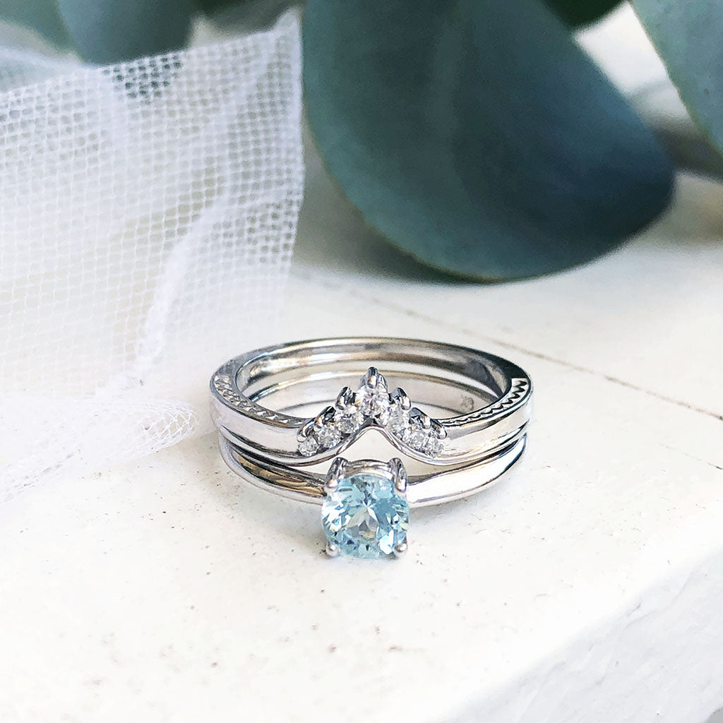Four Claw Round Aquamarine and Seven Diamond Crown Wedding band Set