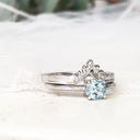 Four Claw Round Aquamarine and Seven Diamond Crown Wedding band Set