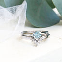 Four Claw Round Aquamarine and Seven Diamond Crown Wedding band Set