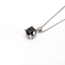 Four Claw Solitaire Black Diamond and White Gold Pendant