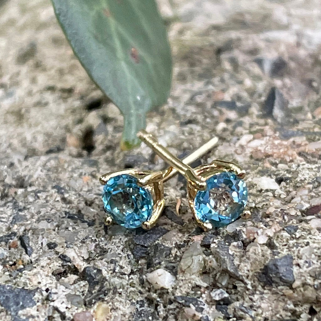 Four Claw Yellow Gold Blue Topaz Earrings Afrogem Jewellers