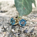 Four Claw Yellow Gold Blue Topaz Earrings