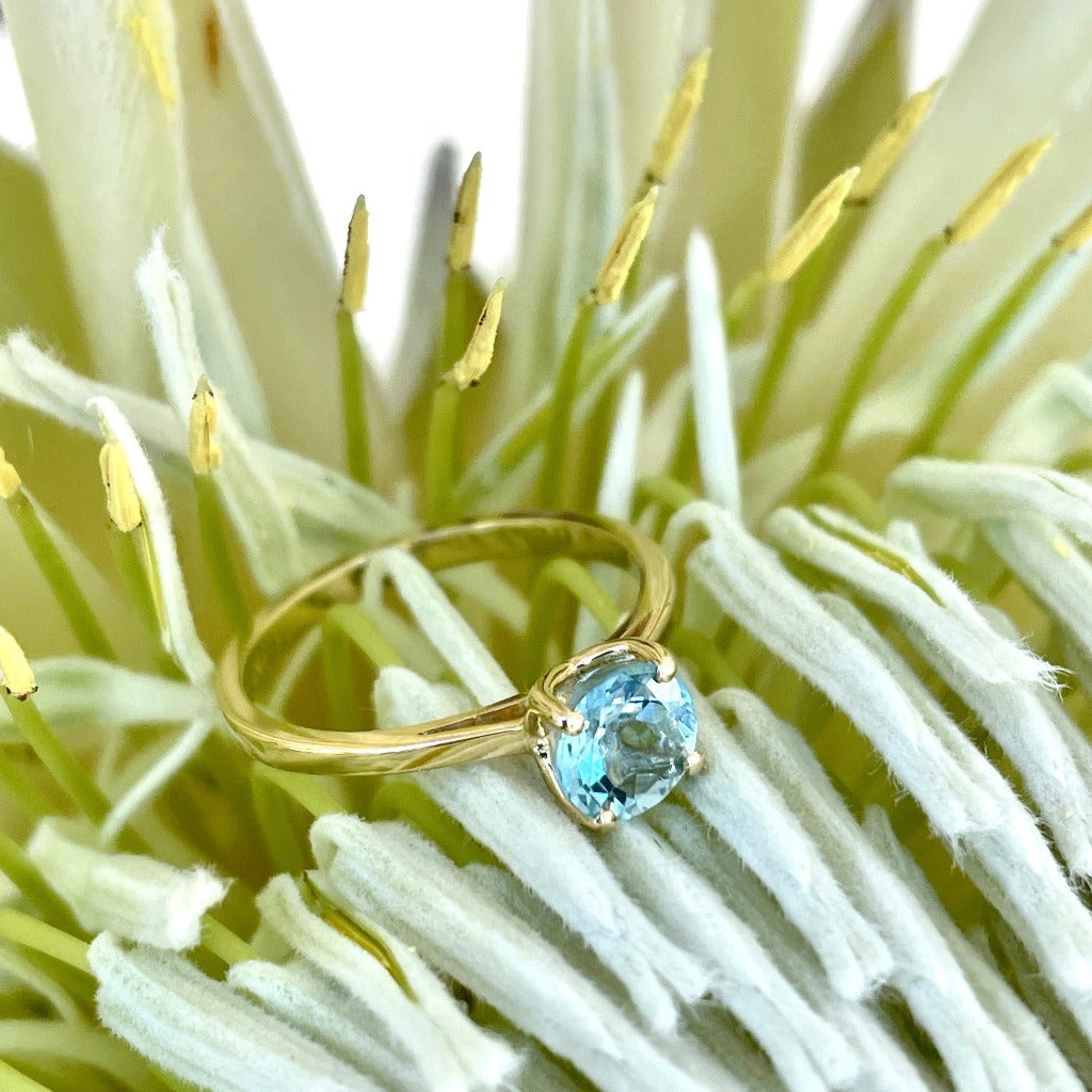 Solitaire Aquamarine Round Cut Four Claw Ring