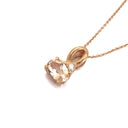 Half Bow Oval Cut Morganite and Diamond Rose Gold Pendant