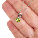 Half Bow Oval Cut Peridot with Diamond Highlight Pendant