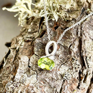 Half Bow Oval Cut Peridot with Diamond Highlight Pendant
