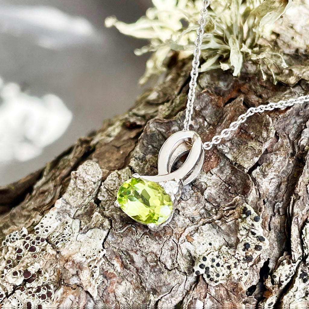 Half Bow Oval Cut Peridot with Diamond Highlight Pendant