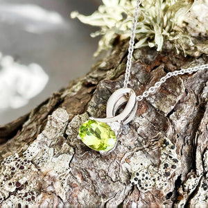Half Bow Oval Cut Peridot with Diamond Highlight Pendant