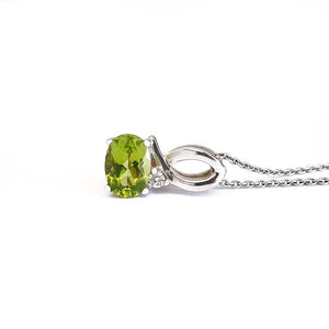  Half Bow Oval Cut Peridot with Diamond Highlight Pendant