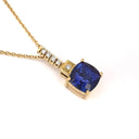 Handcrafted Cushion Cut Tanzanite Yellow Gold Pendant with Diamond Bale Detail