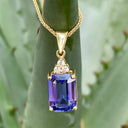 Handcrafted Emerald Cut Tanzanite Pendant And Diamond Trilogy