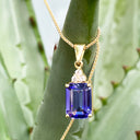Handcrafted Emerald Cut Tanzanite Pendant And Diamond Trilogy