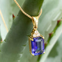 Handcrafted Emerald Cut Tanzanite Pendant And Diamond Trilogy