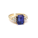 Handcrafted Emerald Cut Tanzanite Ring with Trilogy Diamond Accent