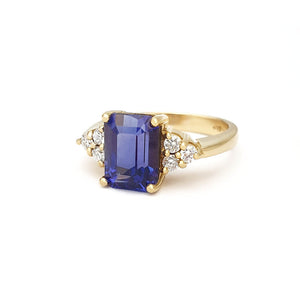 Handcrafted Emerald Cut Tanzanite Ring with Trilogy Diamond Accent
