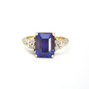 Handcrafted Emerald Cut Tanzanite Ring with Trilogy Diamond Accent