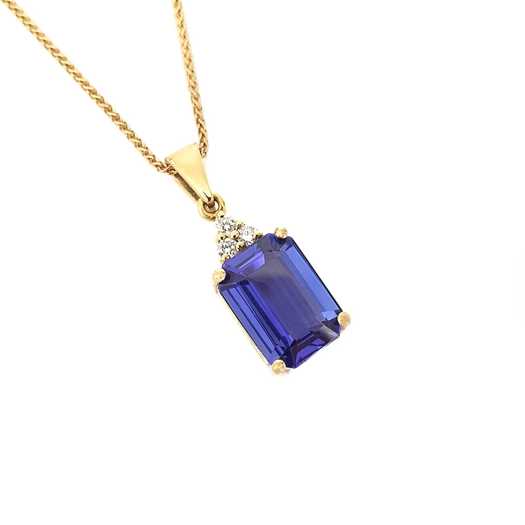 Handcrafted Emerald Cut Tanzanite Yellow Gold Pendant with Diamond Trilogy Detail